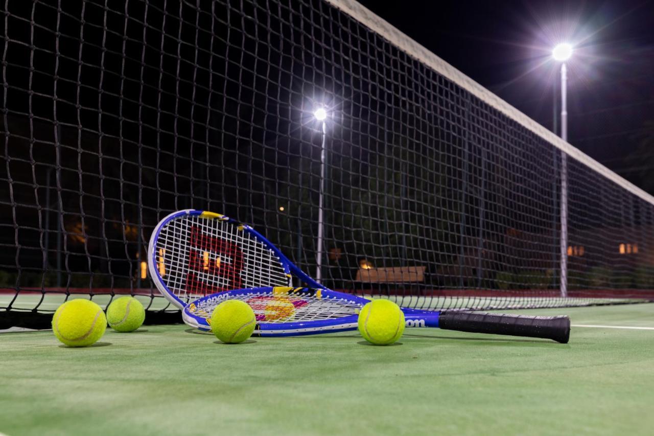Sealine Beach, A Murwab Resort Месайед Екстериор снимка Tennis balls and racket